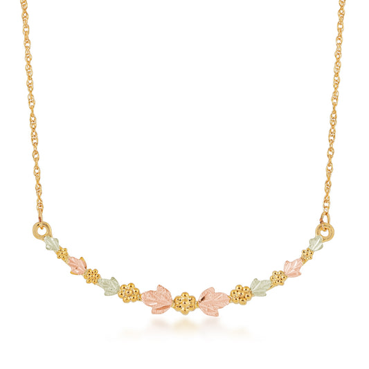 10K yellow gold curved leaf and grape bar necklace by Landstrom's Black Hills Gold