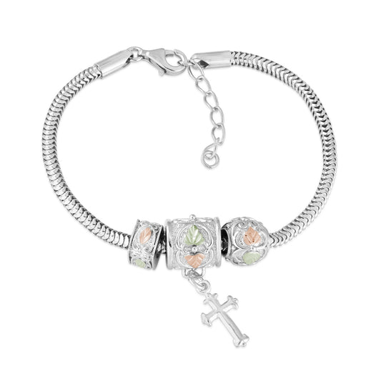 Sterling silver sphere, cube, and dangle cross charm bracelet by Landstrom's Black Hills Gold