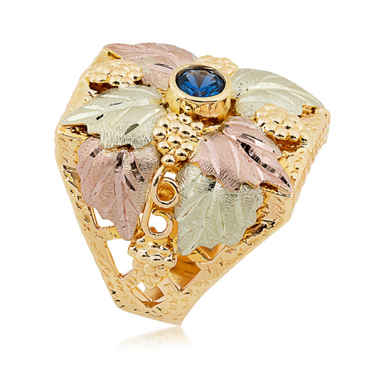 10K yellow gold men's round Yogo sapphire bezel set grape cluster and leaf ring with Black Hills Gold detailing