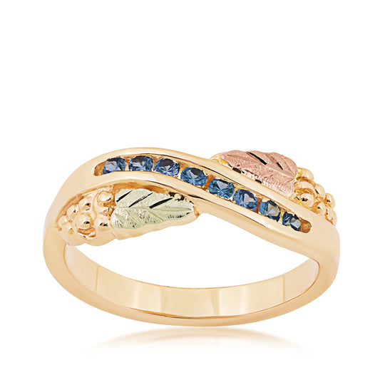 10K yellow gold round Yogo sapphire channel set grape cluster ring with Black Hills Gold detailing