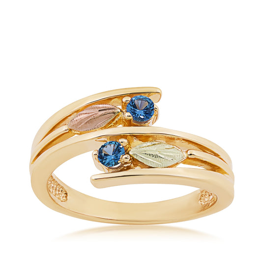 10K yellow gold round 2-stone Yogo sapphire and leaf bypass ring with Black Hills Gold detailing
