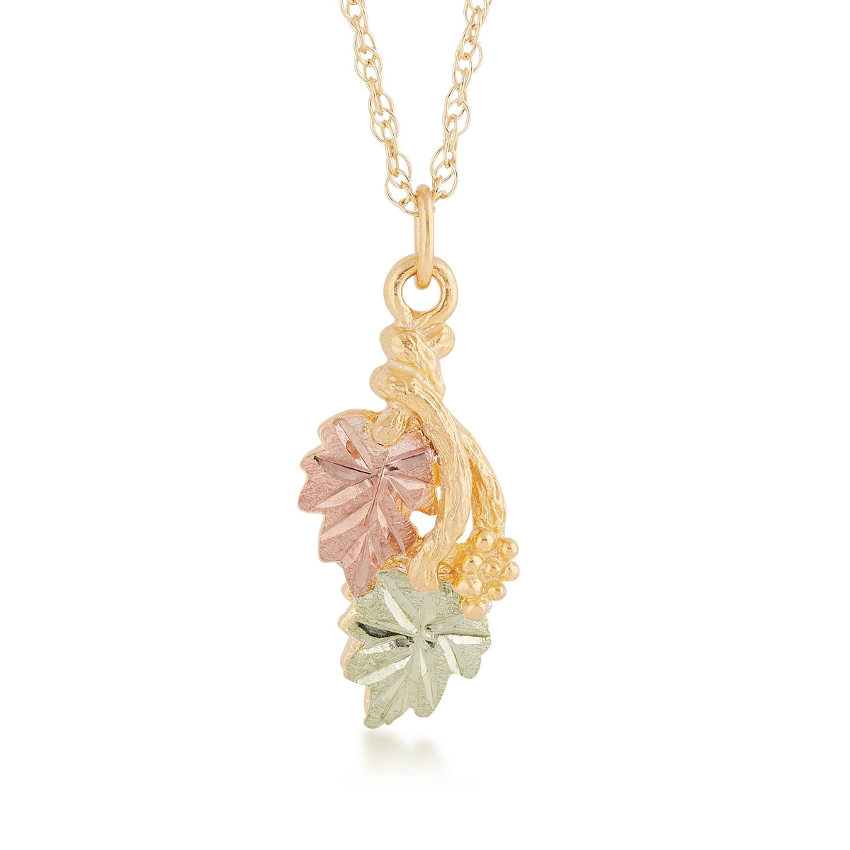 10K yellow gold leaf and grape bunch pendant by Mt. Rushmore Black Hills Gold