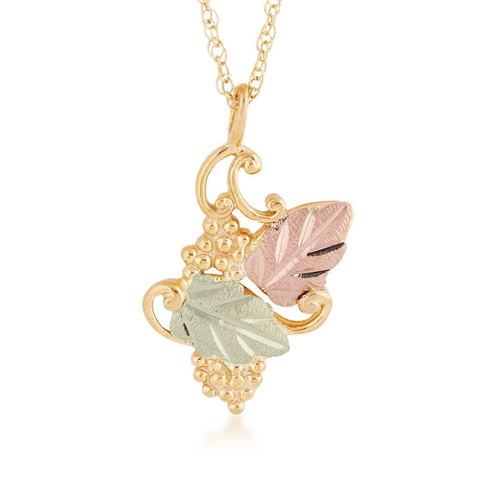 10K yellow gold leaf and double grape bunch pendant by Mt. Rushmore Black Hills Gold