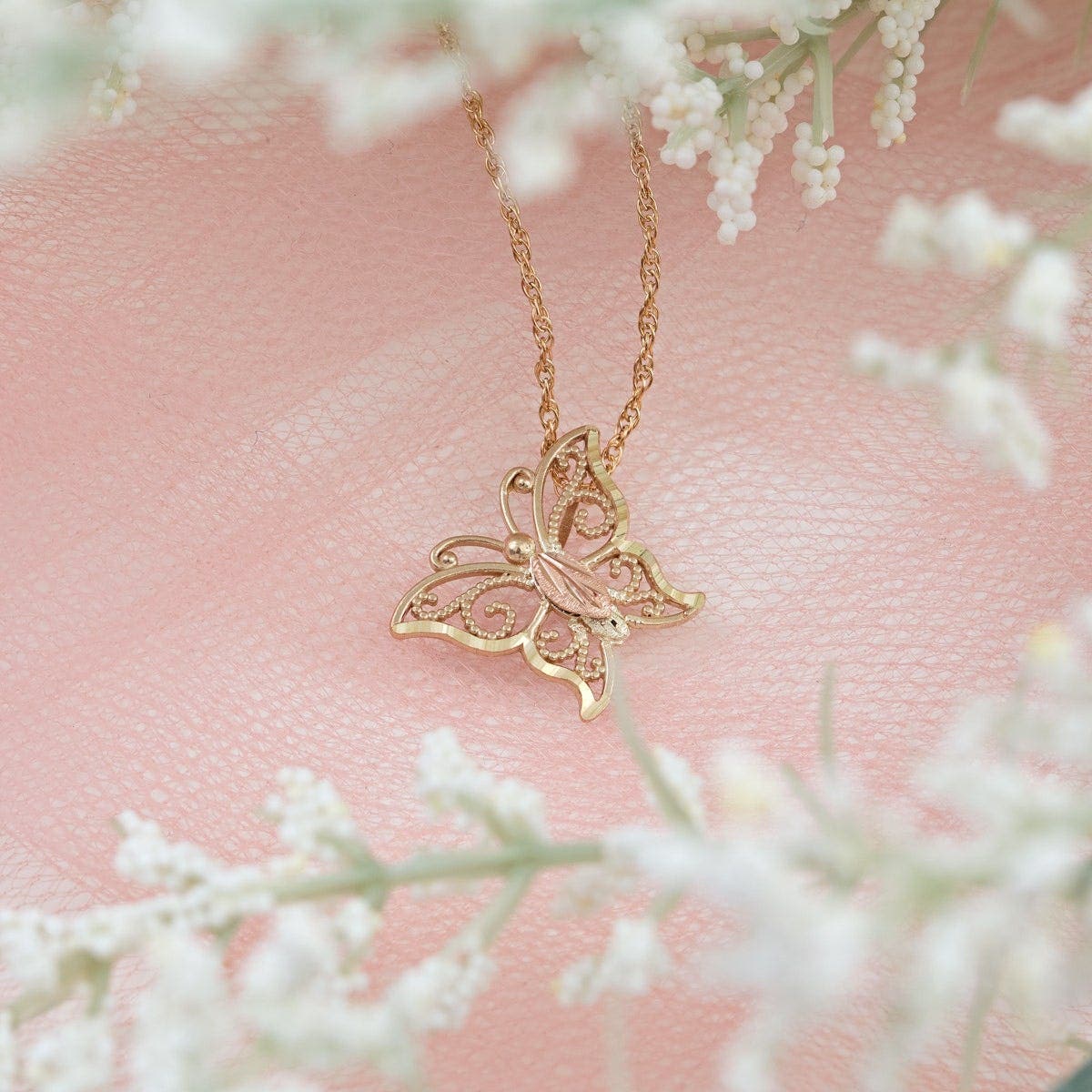 10K yellow gold open milgrain butterfly pendant by Mt. Rushmore Black Hills Gold