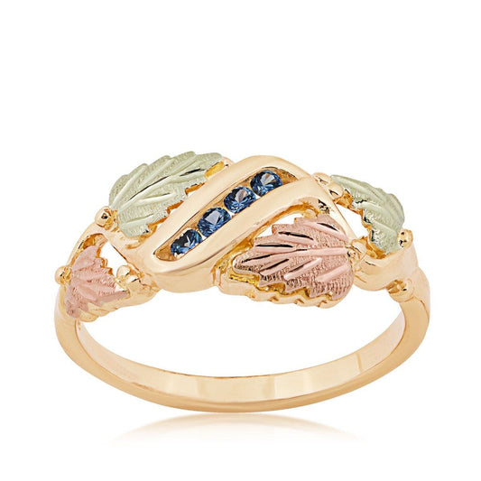 10K yellow gold round Yogo sapphire channel set grapevine and leaf ring with Black Hills Gold detailing