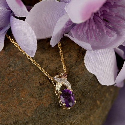 10K yellow gold oval amethyst and diamond accent twist pendant by Mt. Rushmore Black Hills Gold