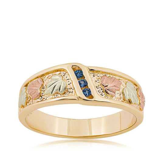 10K yellow gold men's round 3-stone Yogo sapphire channel set wedding ring with Black Hills Gold detailing