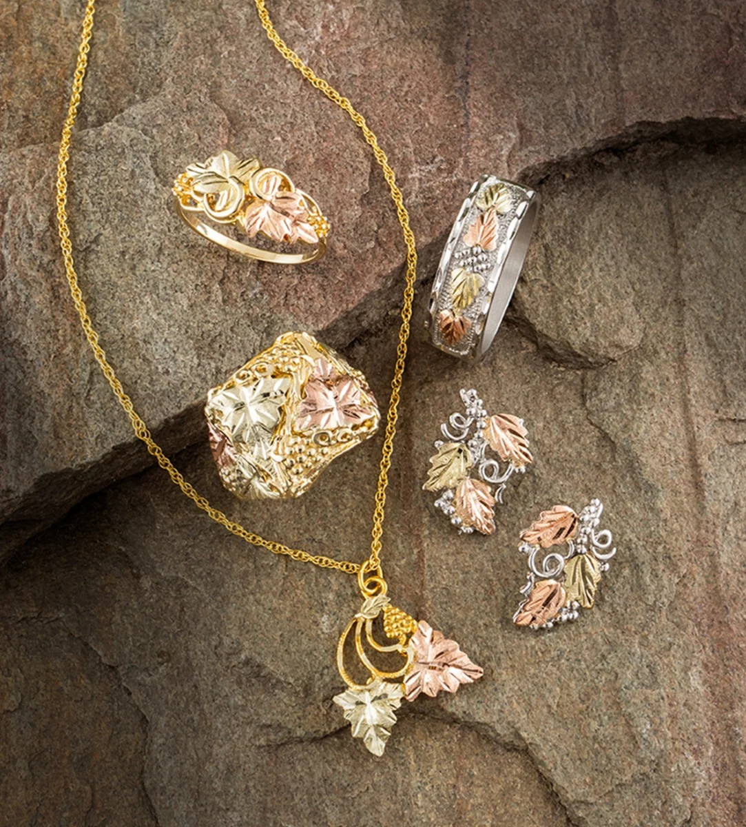 ensemble of Black Hills gold and silver jewelry