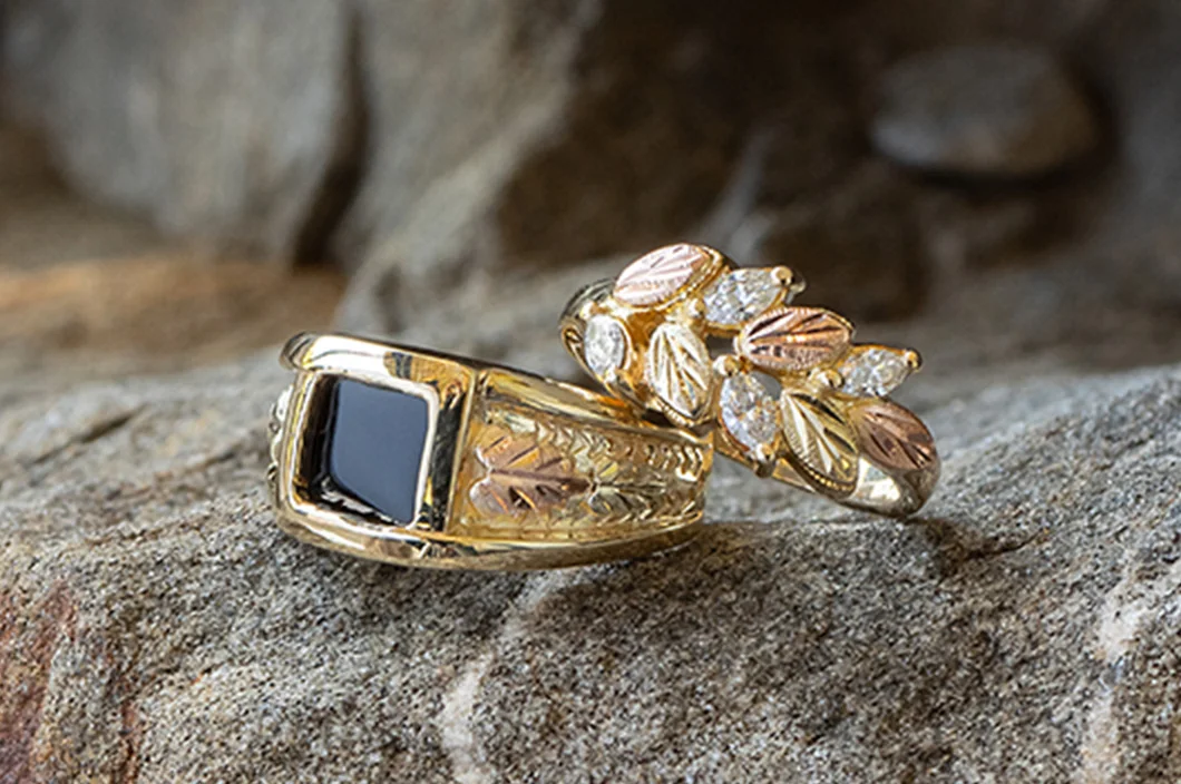 Black Hills gold rings with diamonds and onyx