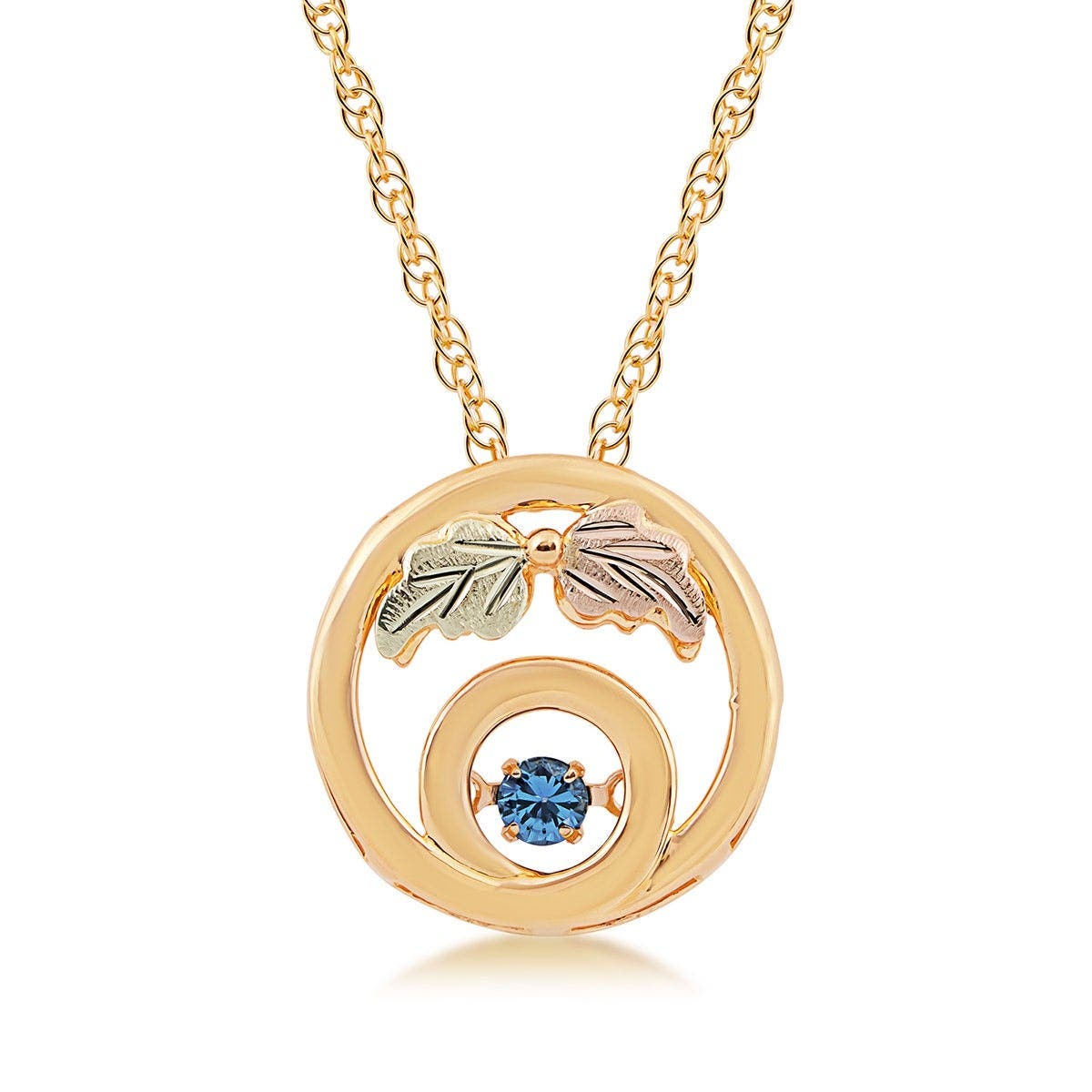 10K yellow gold round Yogo sapphire circle pendant with Black Hills Gold detailing