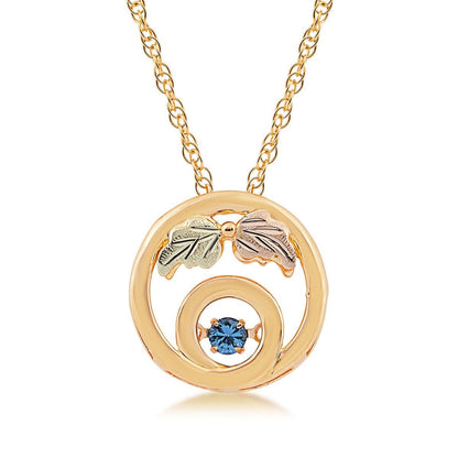 10K yellow gold round Yogo sapphire circle pendant with Black Hills Gold detailing