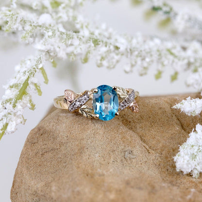 10K yellow gold oval blue topaz and diamond accent ring by Mt. Rushmore Black Hills Gold