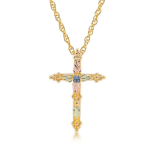 10K yellow gold round Yogo sapphire and grape cluster cross pendant with Black Hills Gold detailing